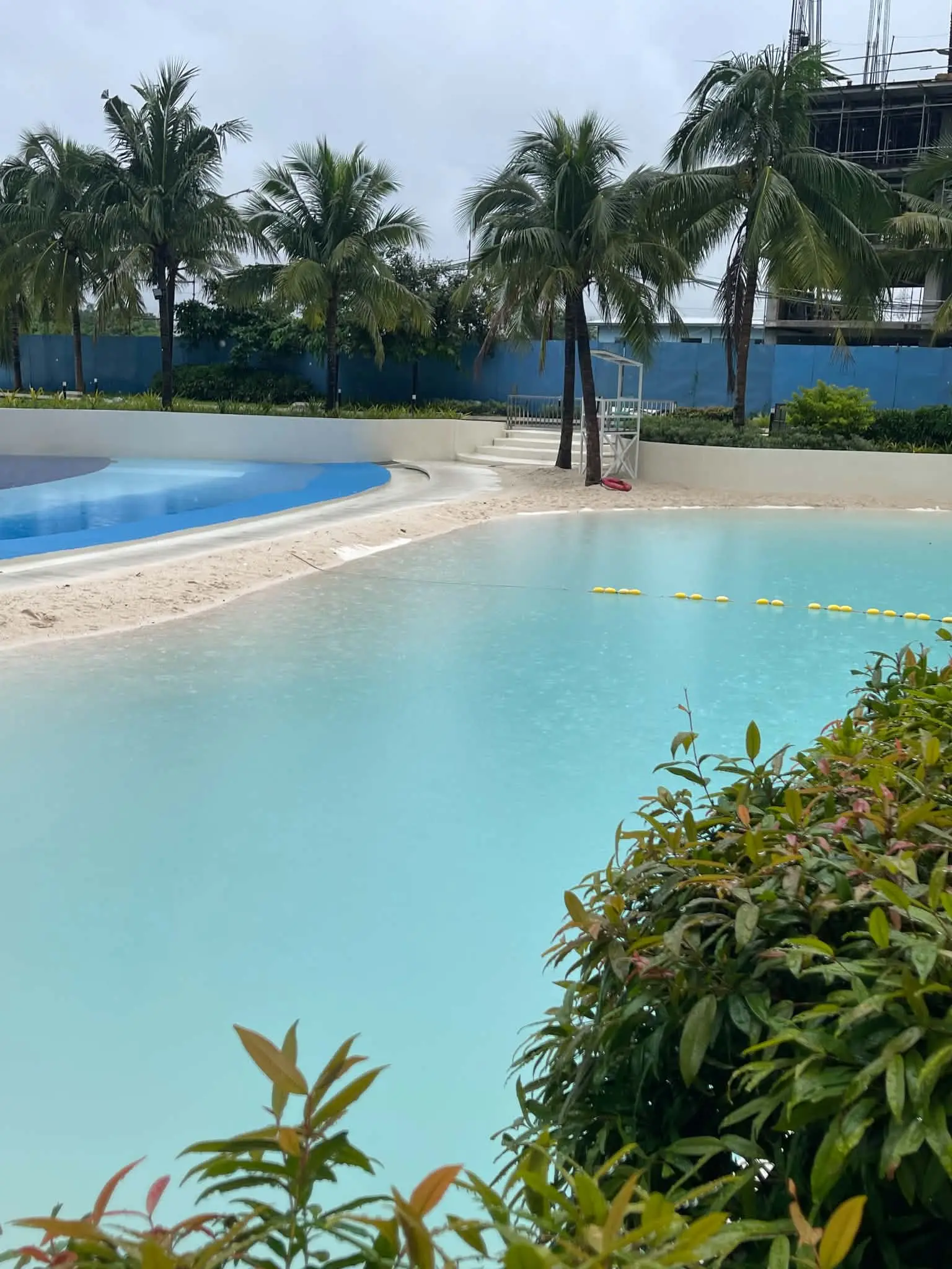 Blue infinity-style community pool at Azure North